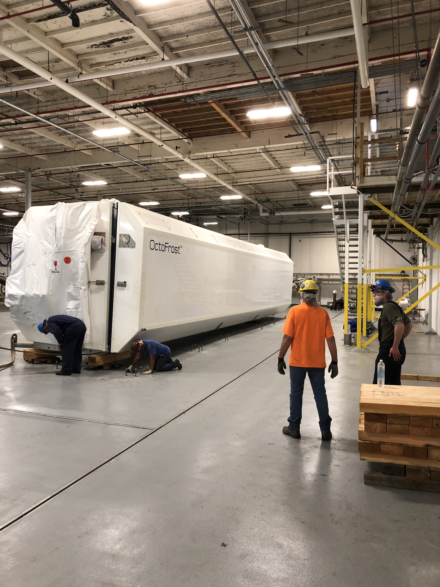 Freezer being positioned indoors
